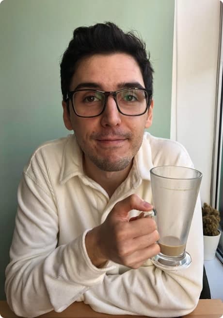 Istvan drinking coffee.